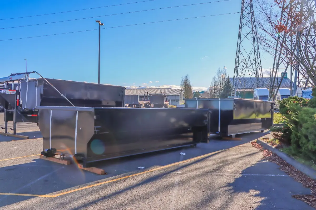 Roll-off dumpster ready for waste disposal at job site for 2 Yard Dumpster Rental in East Rancho Dominguez